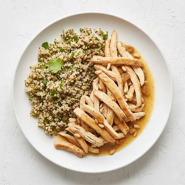 Honey -Rosemary glazed chicken with pine nuts & herb infused Quinoa and roasted garlic pan sauce